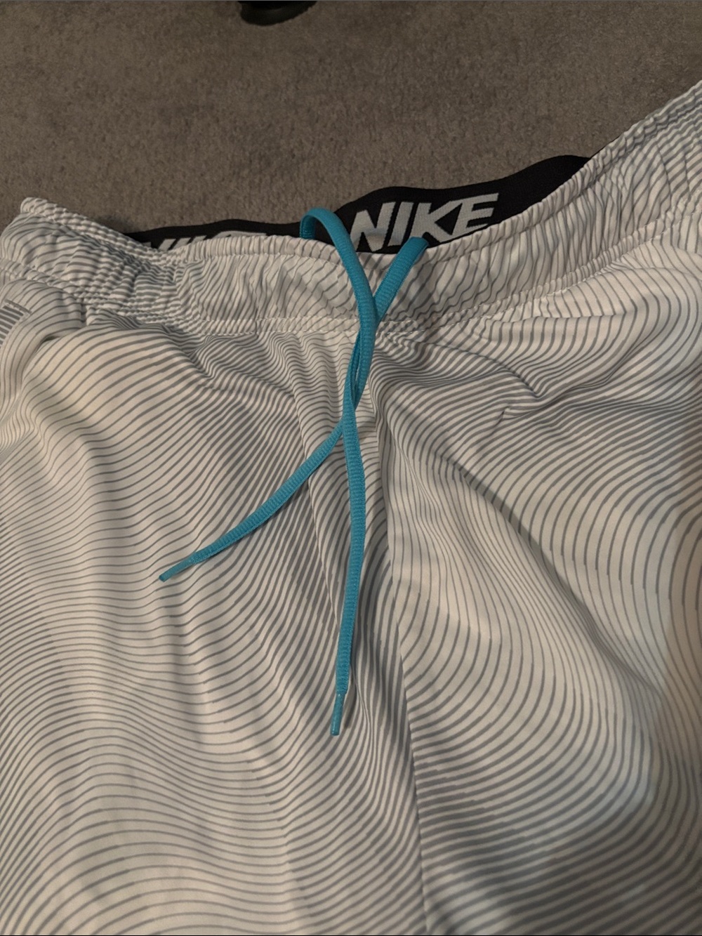 Nike Men’s White Athletic Shorts with Blue Swoosh - Picture 3 of 6